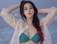高清：张馨予海滩写真曝光 比基尼尽显迷人曲线